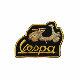 Kleine Motard-Embleme der Marke Vespa.