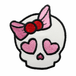 Boneca caveira com laço