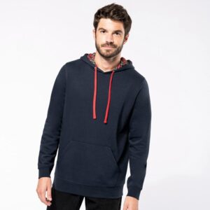 Sudadera unisex con capucha estampada a contraste.