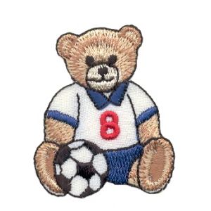 Insignias de Living Child Bear con balón de fútbol